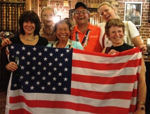Flag-wearing Amy and her United Flight Attendant Friends at the Chase/VISA house before sushi dinner